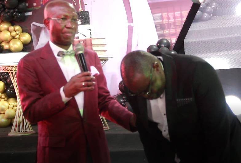 Chie Wole Olanipekun praying for Rotimi Jacobs 