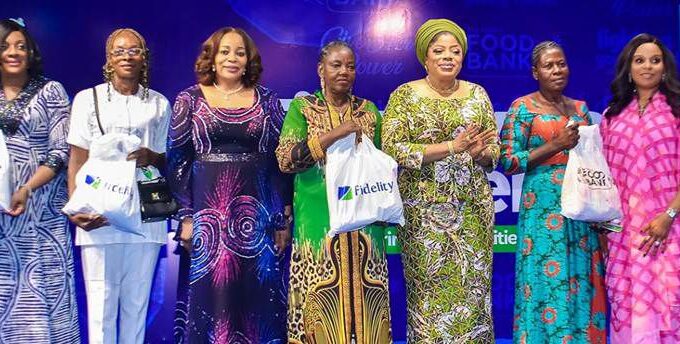 Mrs. Pamela Shodipo, Executive Director, South, Fidelity Bank Plc (2nd L); Mrs. Amaka Onwughalu, Chairman, Board of Directors, Fidelity Bank Plc (4th L); Dr. Nneka Onyeali-Ikpe, MD/CEO, Fidelity Bank Plc (6th L); and Dr (Mrs.) Nonye Soludo, First Lady of Anambra State (2nd R), with the beneficiaries at the Fidelity Bank Empowerment Programme organized in partnership with Healthy Living with Nonye Soludo Foundation, held in Awka, Anambra State recently.